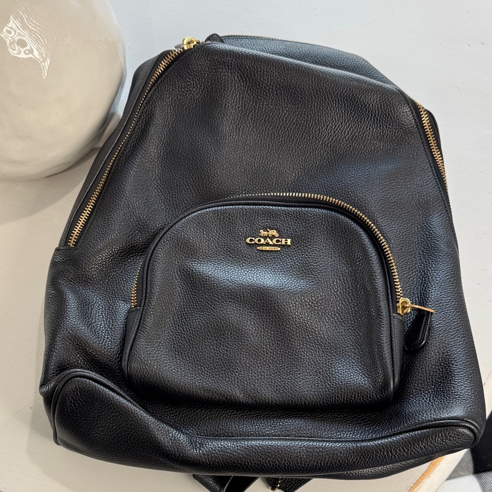 Coach Black Leather Backpack with Gold Accents